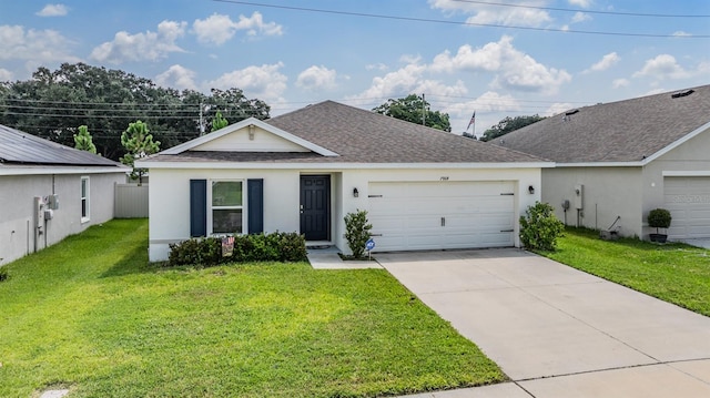 ranch-style house featuring a garage and a front yard