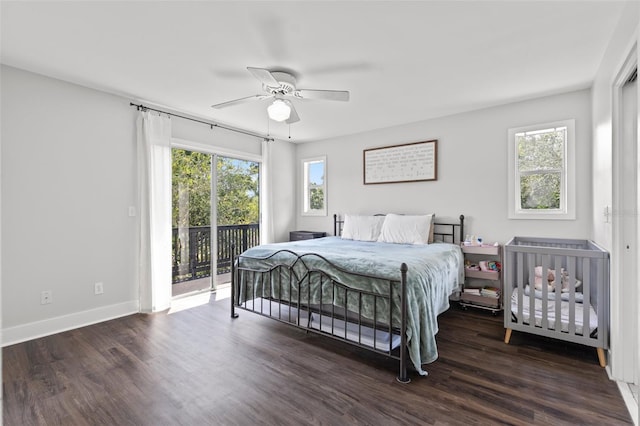 bedroom with dark wood-type flooring, multiple windows, ceiling fan, and access to outside