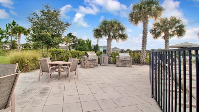 view of patio / terrace featuring exterior kitchen and grilling area