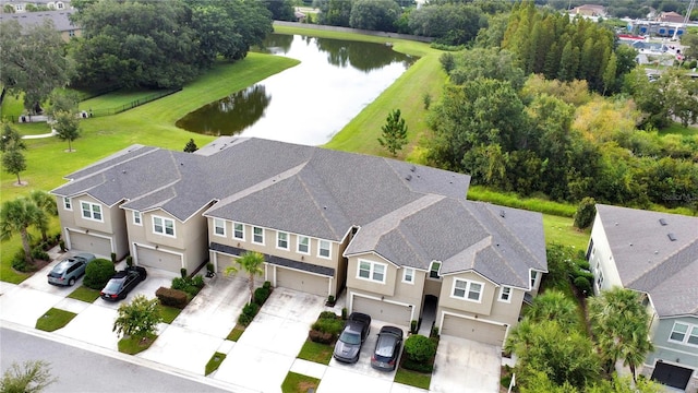 aerial view with a water view and a residential view