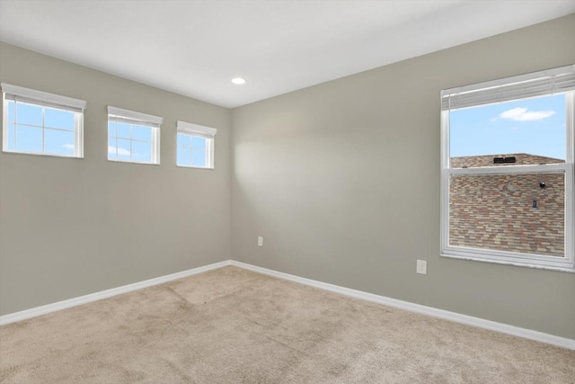 spare room featuring carpet floors