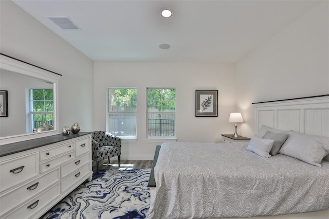 bedroom featuring wood-type flooring