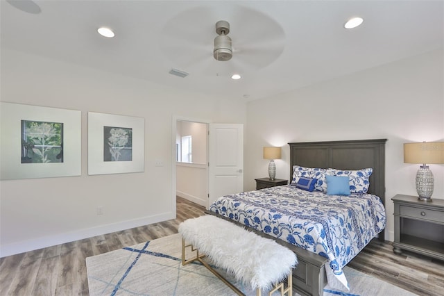 bedroom featuring ceiling fan and wood-type flooring