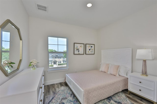 bedroom featuring wood-type flooring