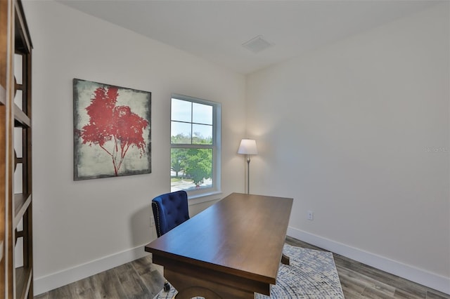 office space featuring hardwood / wood-style floors