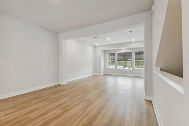 spare room with light wood-type flooring