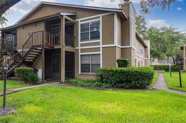 exterior space with a front lawn