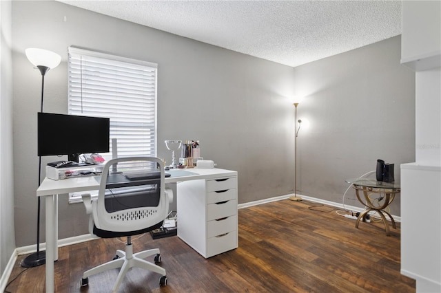 home office with hardwood / wood-style flooring and a textured ceiling