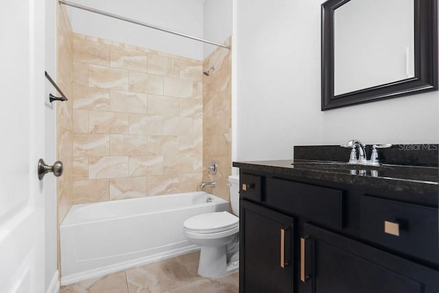 full bathroom with toilet, tiled shower / bath combo, vanity, and tile patterned floors