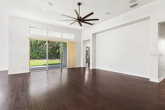 unfurnished room featuring dark hardwood / wood-style floors and ceiling fan