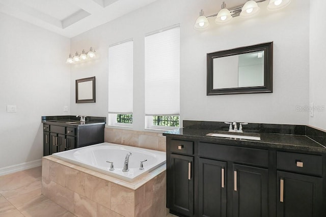 bathroom featuring vanity, a relaxing tiled tub, and tile patterned floors