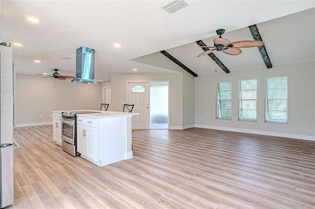 kitchen featuring stainless steel electric range, white cabinets, island range hood, lofted ceiling with beams, and a kitchen island with sink