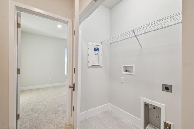 laundry room featuring electric dryer hookup, light carpet, and washer hookup