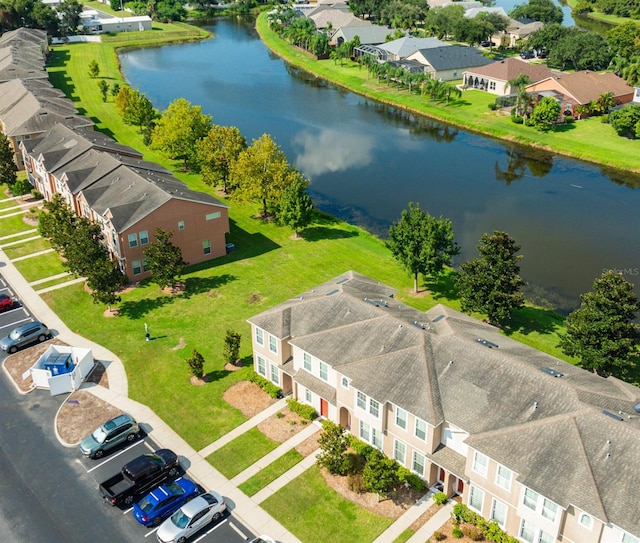 bird's eye view with a water view