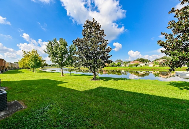 view of yard with a water view