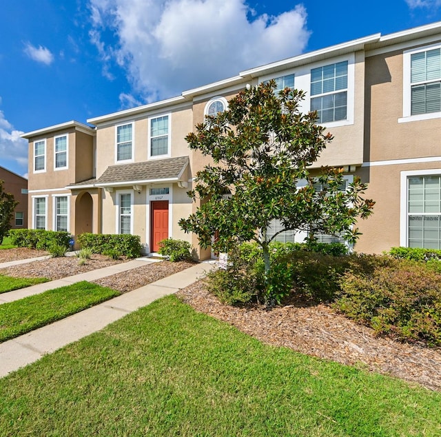 view of property with a front yard