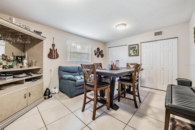 1611 Stevenson Dr, Clearwater, FL 33755 - dining room featuring light tile patterned floors
