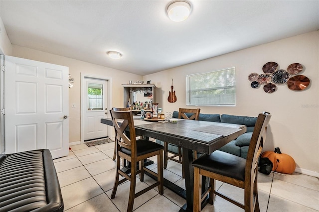 1611 Stevenson Dr, Clearwater, FL 33755 - dining area with light tile patterned flooring and baseboards