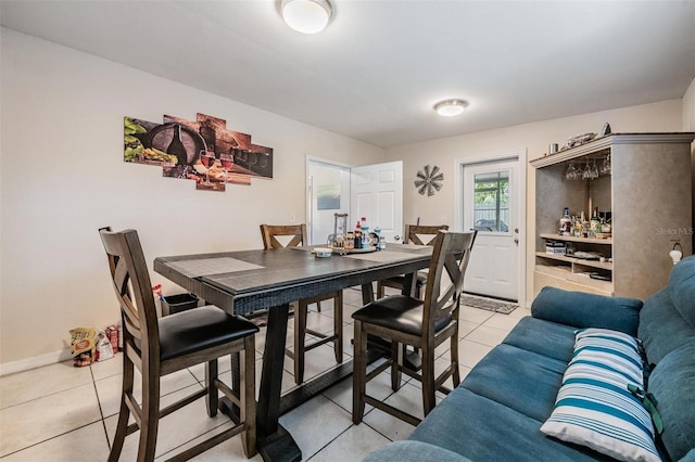 1611 Stevenson Dr, Clearwater, FL 33755 - dining area featuring light tile patterned flooring