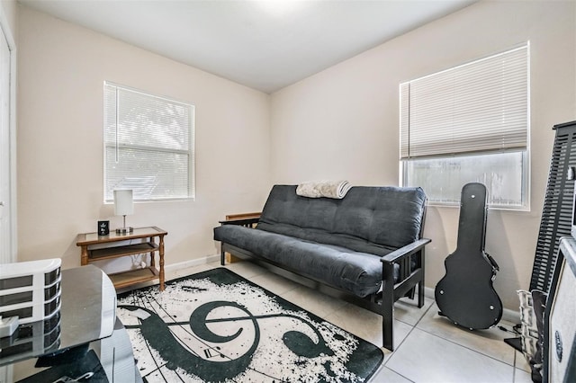 1611 Stevenson Dr, Clearwater, FL 33755 - living area featuring tile patterned floors and baseboards