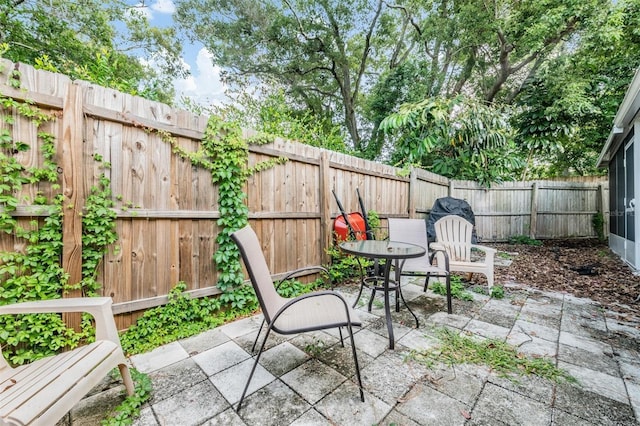 1611 Stevenson Dr, Clearwater, FL 33755 - fenced backyard with a patio