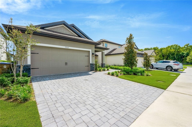 ranch-style home with a garage