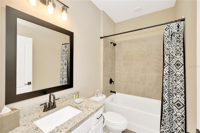 bathroom with toilet, shower / bath combination with curtain, and vanity