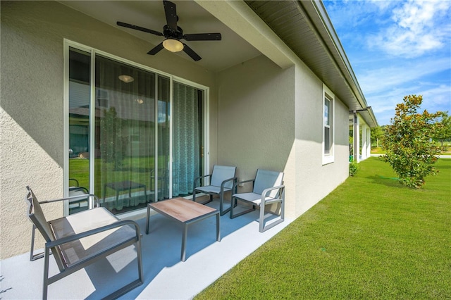 view of patio with ceiling fan