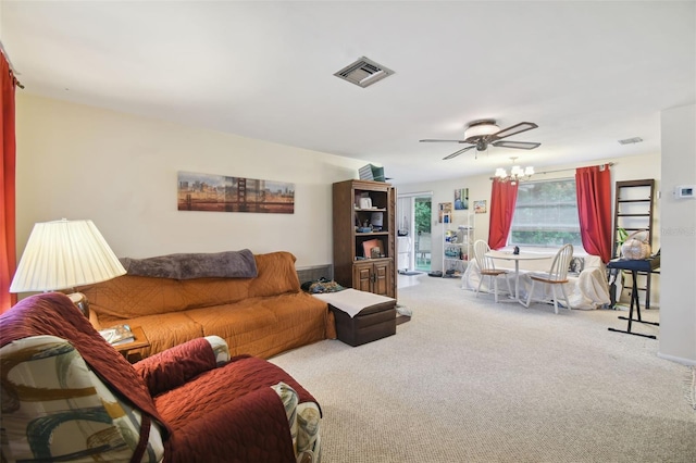 living room with ceiling fan and carpet floors