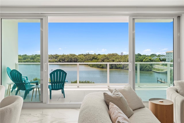 sunroom with a water view