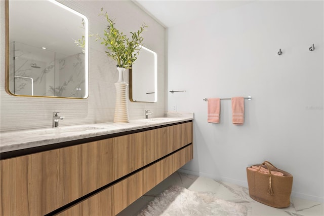 bathroom featuring tile patterned flooring, decorative backsplash, vanity, and walk in shower