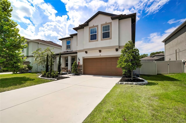 view of front of house featuring a garage and a front yard