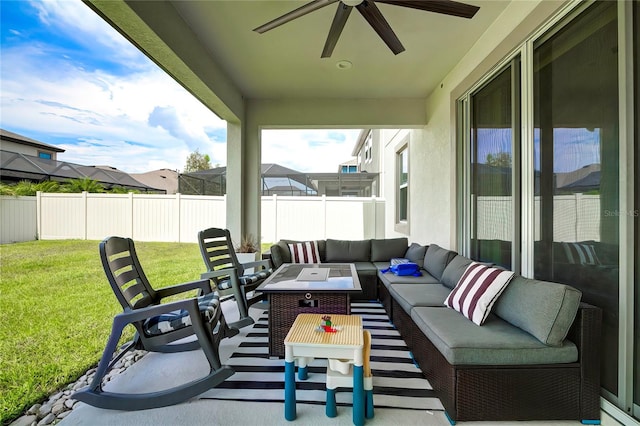 view of patio with ceiling fan and an outdoor hangout area