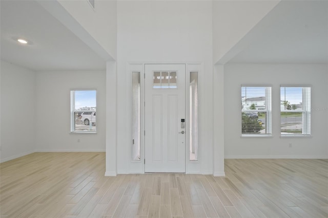 entrance foyer with light wood-type flooring