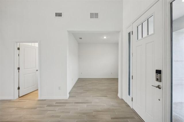 hallway featuring light hardwood / wood-style floors