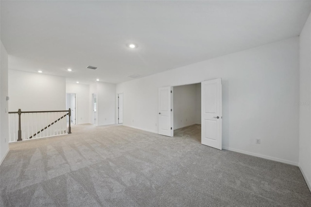 unfurnished room with carpet floors