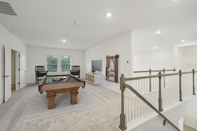 rec room with light colored carpet and billiards