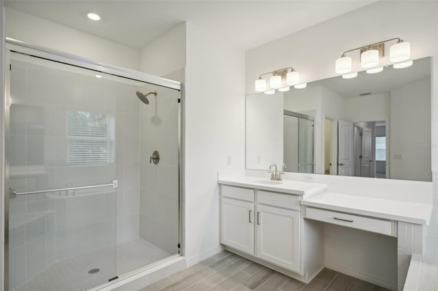 bathroom with vanity and walk in shower