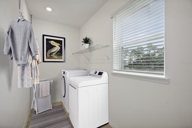 washroom with independent washer and dryer