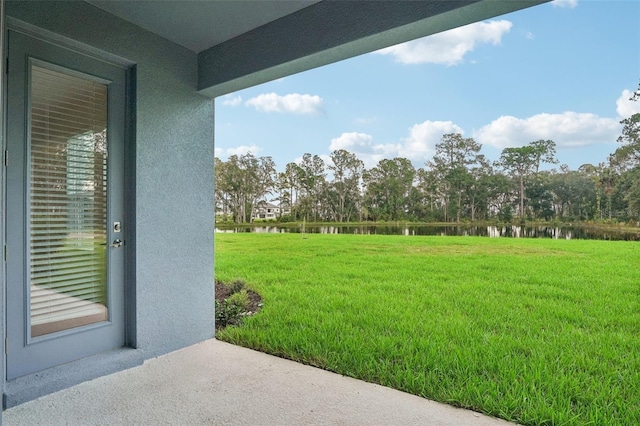 view of yard with a water view