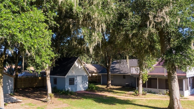 exterior space with a storage shed