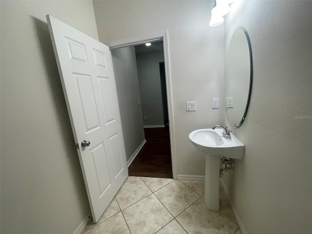 bathroom featuring sink and tile patterned flooring