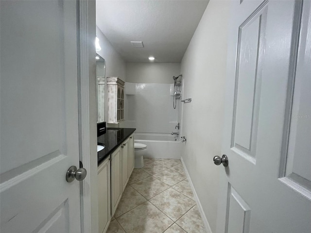 full bathroom featuring bathing tub / shower combination, toilet, vanity, and tile patterned flooring