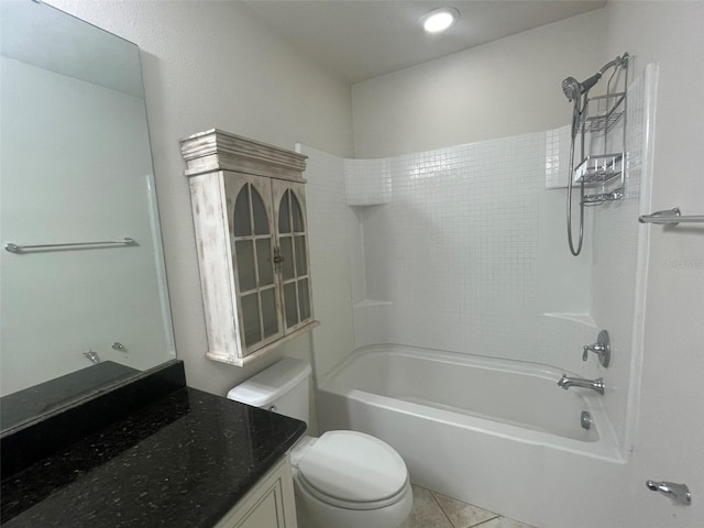 full bathroom featuring vanity, tile patterned flooring, toilet, and bathtub / shower combination