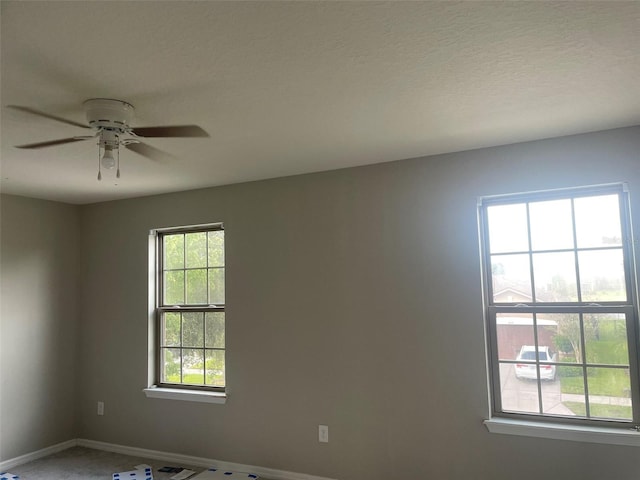 empty room with ceiling fan