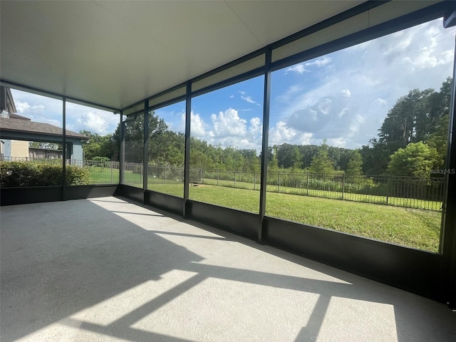 unfurnished sunroom with a healthy amount of sunlight