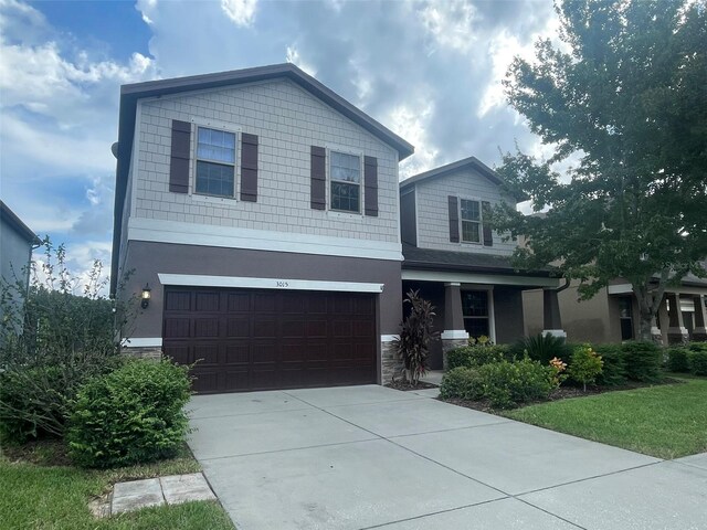 view of front of home with a garage