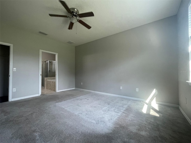 unfurnished bedroom featuring ensuite bathroom, ceiling fan, and carpet floors