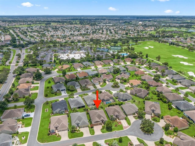 aerial view with a residential view and golf course view