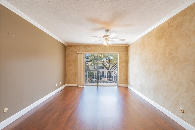 spare room with ceiling fan, hardwood / wood-style flooring, crown molding, and a textured ceiling